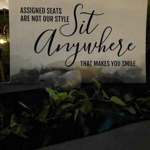 Sit Anywhere Sign with Greenery